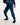 Man in a navy sauna suit tracksuit with a white boxraw logo on the chest as well as adjustable wrist straps and made from polyester.