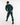 Man in a green sauna suit tracksuit with a white boxraw logo on the chest as well as adjustable wrist straps and made from polyester.