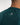 Man in a green sauna suit tracksuit with a white boxraw logo on the chest as well as adjustable wrist straps and made from polyester.